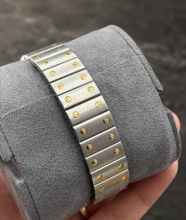 Cartier Santos Galbée 1566 in acciaio e oro: bracciale su cuscino